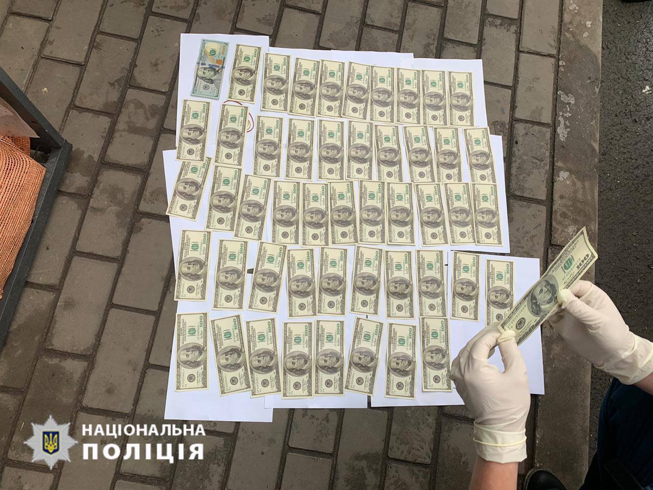 Никопольского полицейского задержали за взятку в 5000 долларов | Прихист 